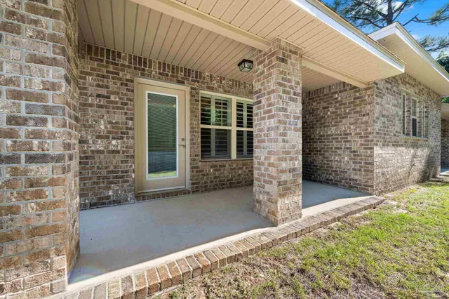 a front view of a house with an empty space