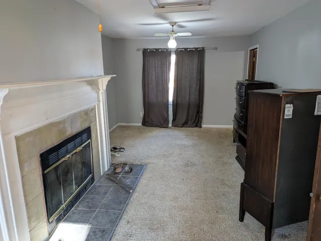 a view of a livingroom with a fireplace