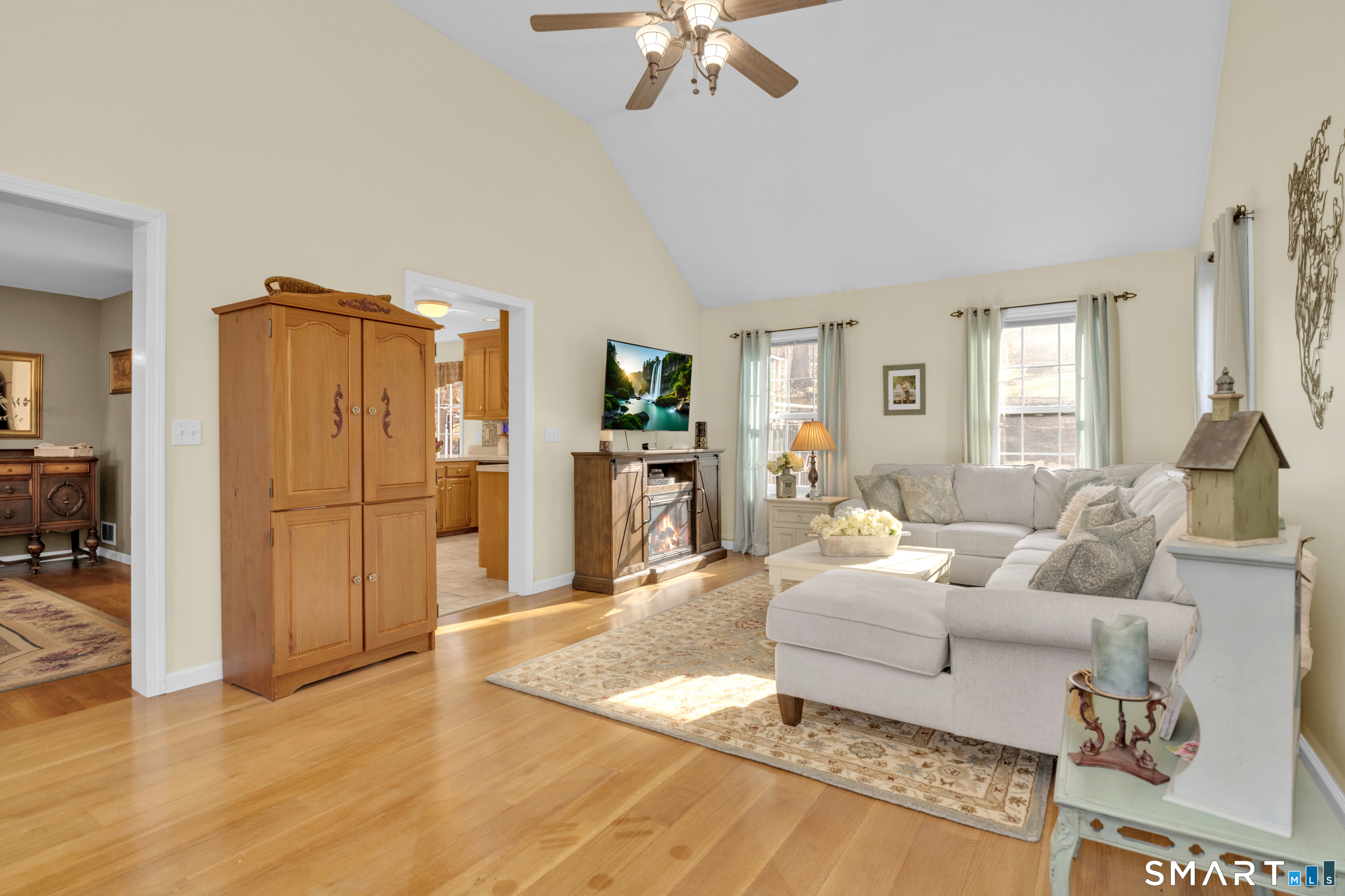 138 Burton Road Beacon Falls, CT 06403 - Photo 23 of 40 a living room with furniture and a chandelier