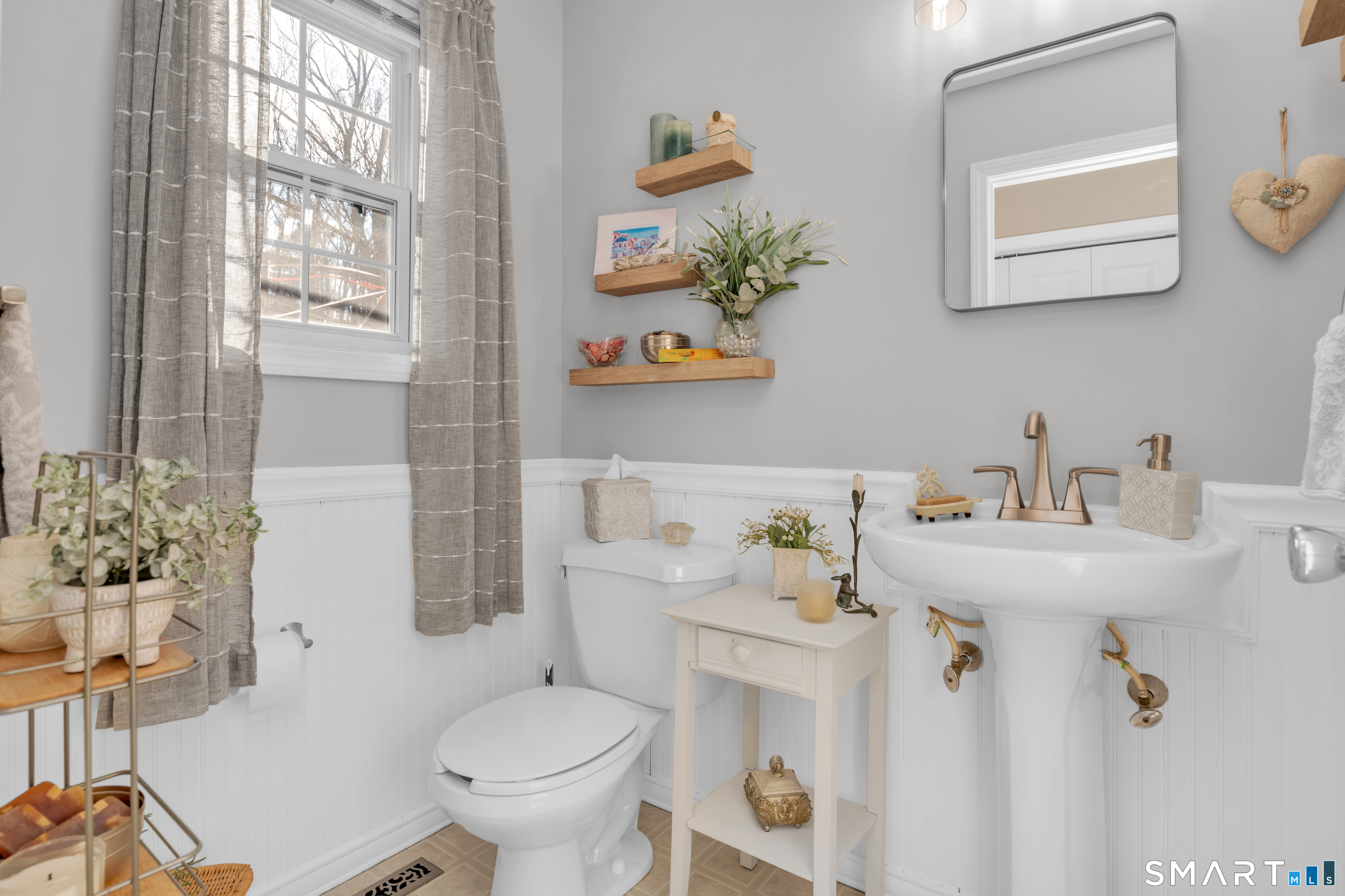 138 Burton Road Beacon Falls, CT 06403 - Photo 26 of 40 a bathroom with a sink mirror and toilet