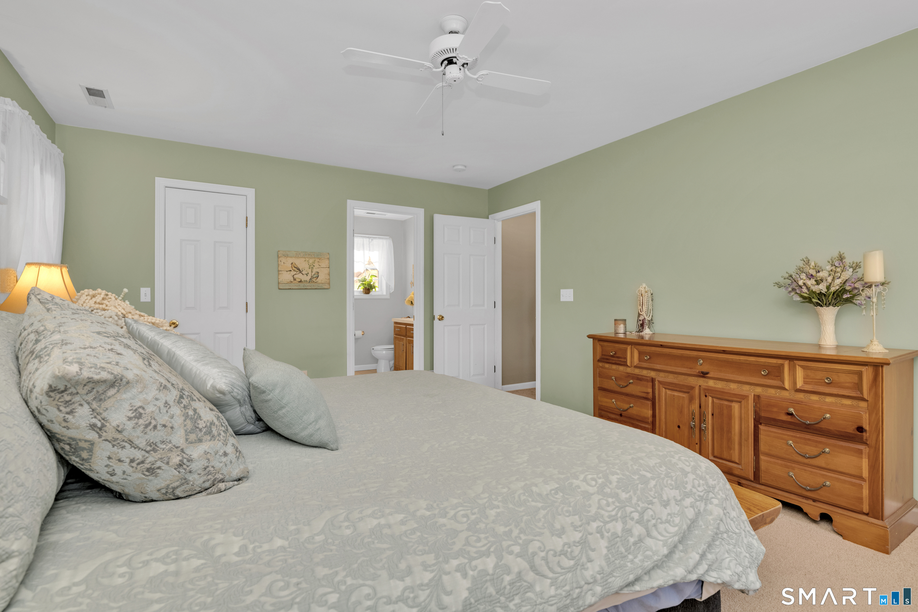138 Burton Road Beacon Falls, CT 06403 - Photo 28 of 40 a bedroom with a large bed and a dresser