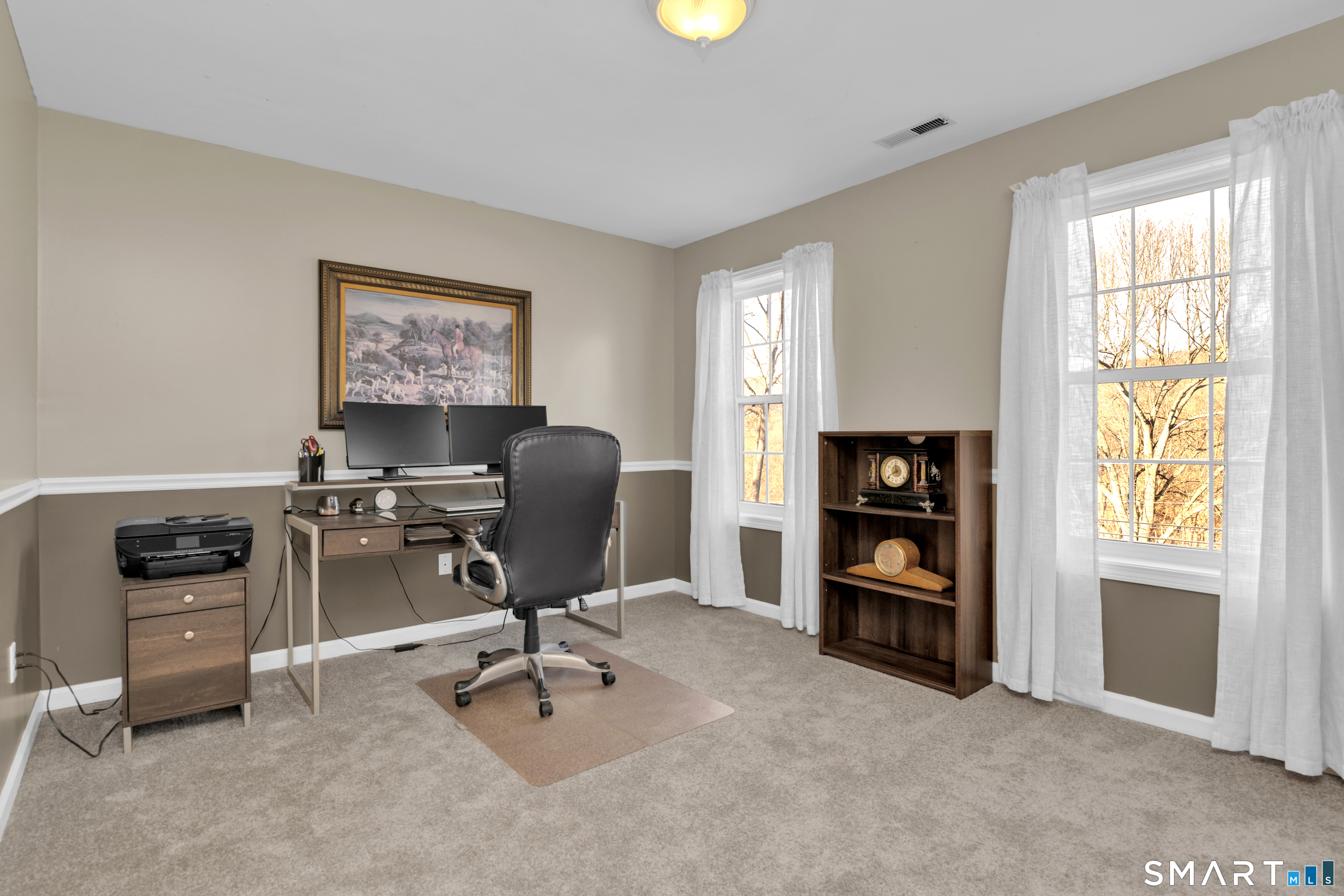 138 Burton Road Beacon Falls, CT 06403 - Photo 30 of 40 a view of a workspace with furniture and a window