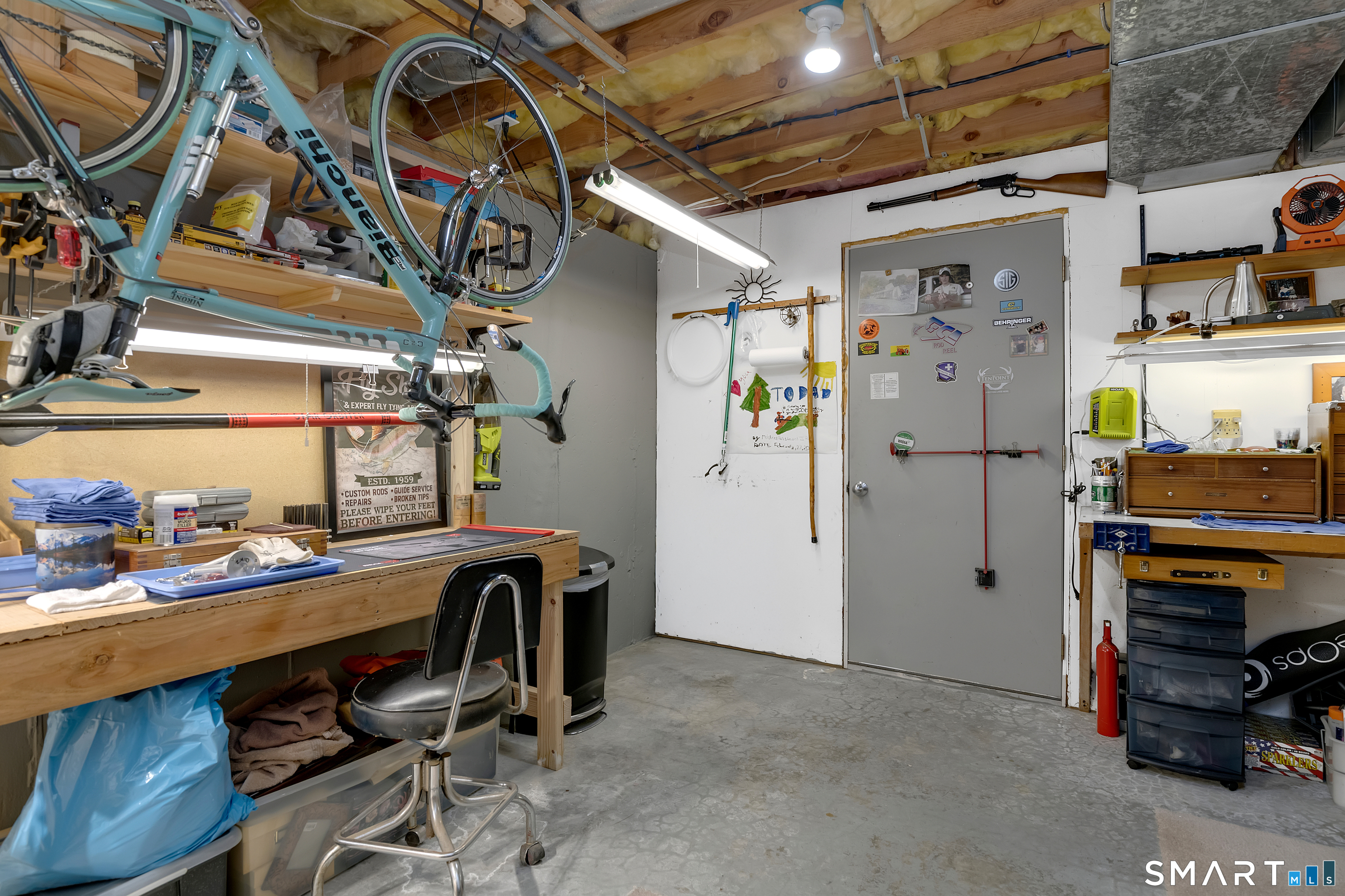138 Burton Road Beacon Falls, CT 06403 - Photo 34 of 40 a view of a storage & utility room with racks a window