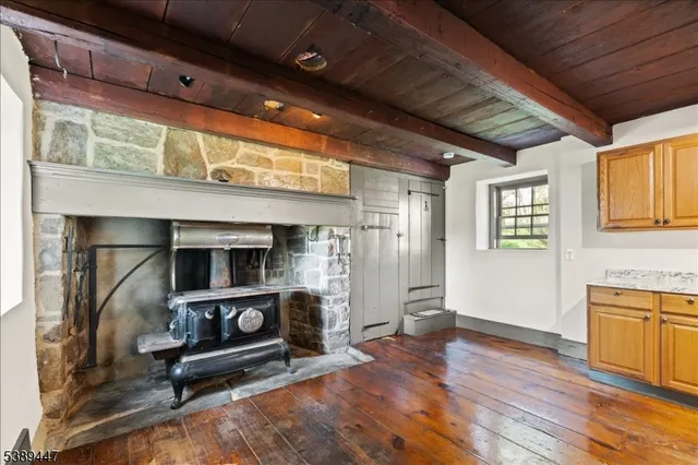 a room with furniture and wooden floor