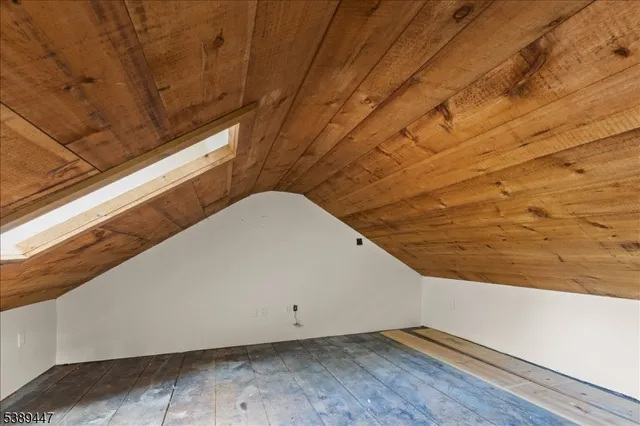 a view of wooden floor in a bathroom