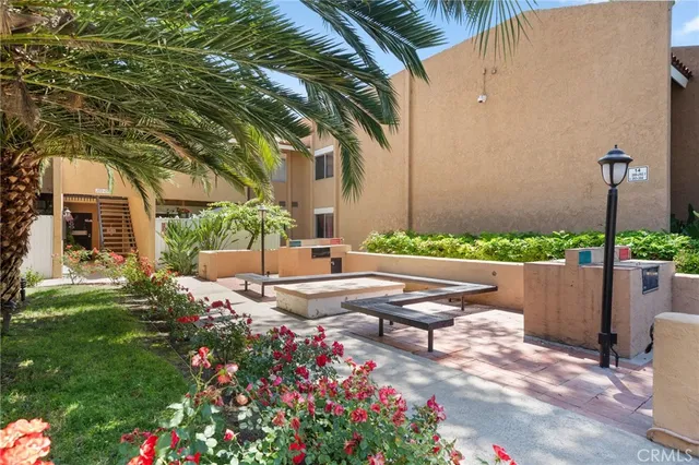 a view of a backyard with garden