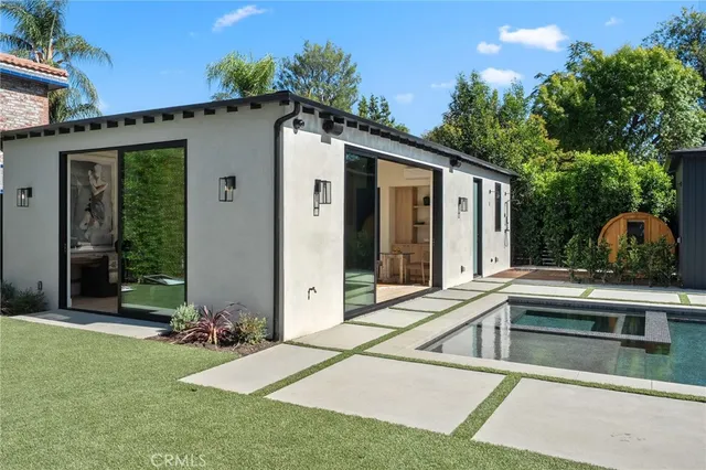 a view of a house with a swimming pool