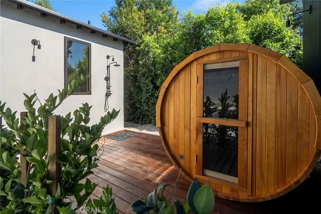 a view of a balcony with wooden floor