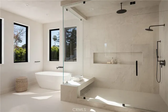 a front view of house with yard and car parked