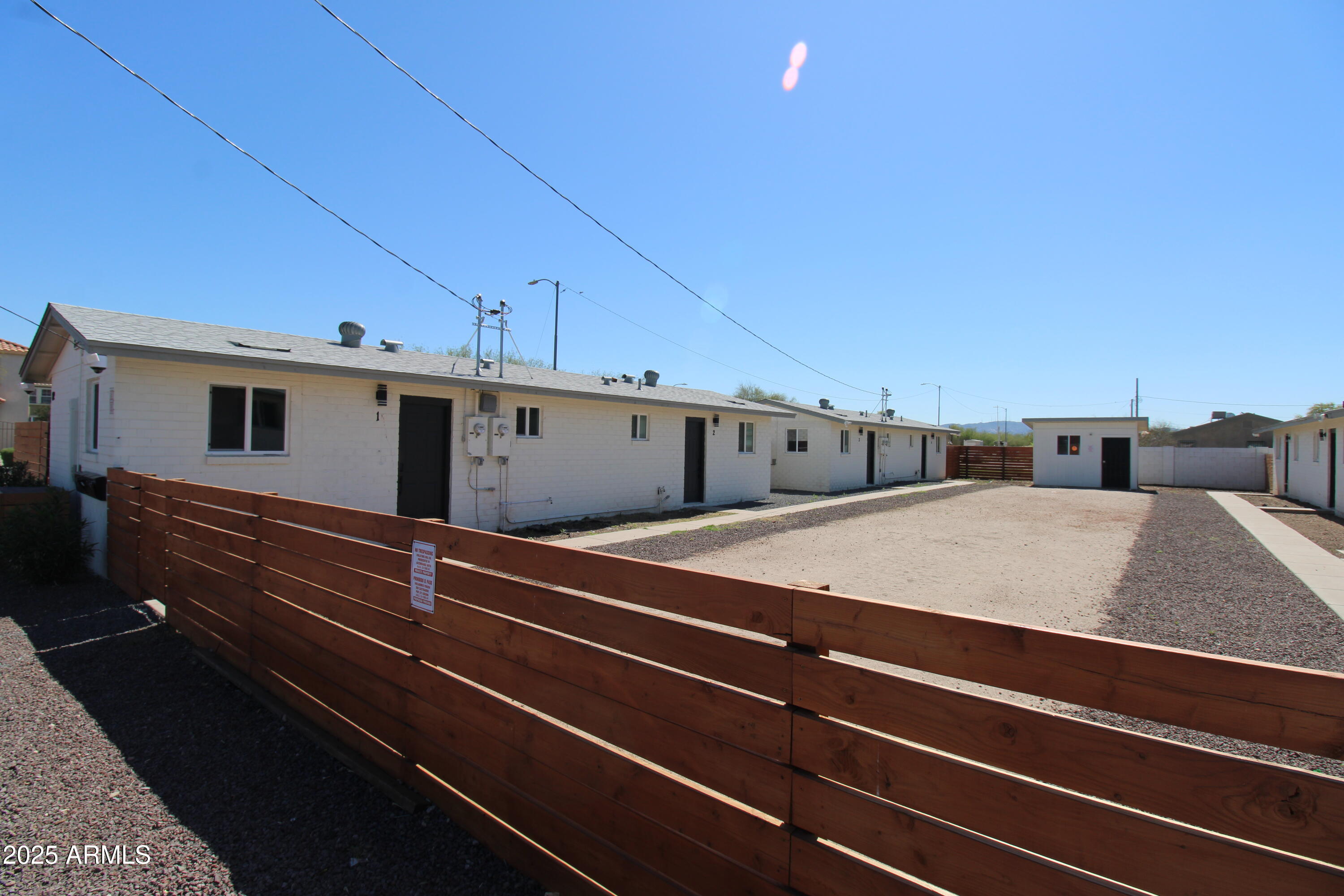 802 South 11th Avenue, Unit 4 Phoenix, AZ 85007 - Photo 1 of 11 a view of a back yard of the house