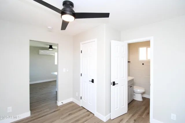 a view of a bathroom with a hardwood floor