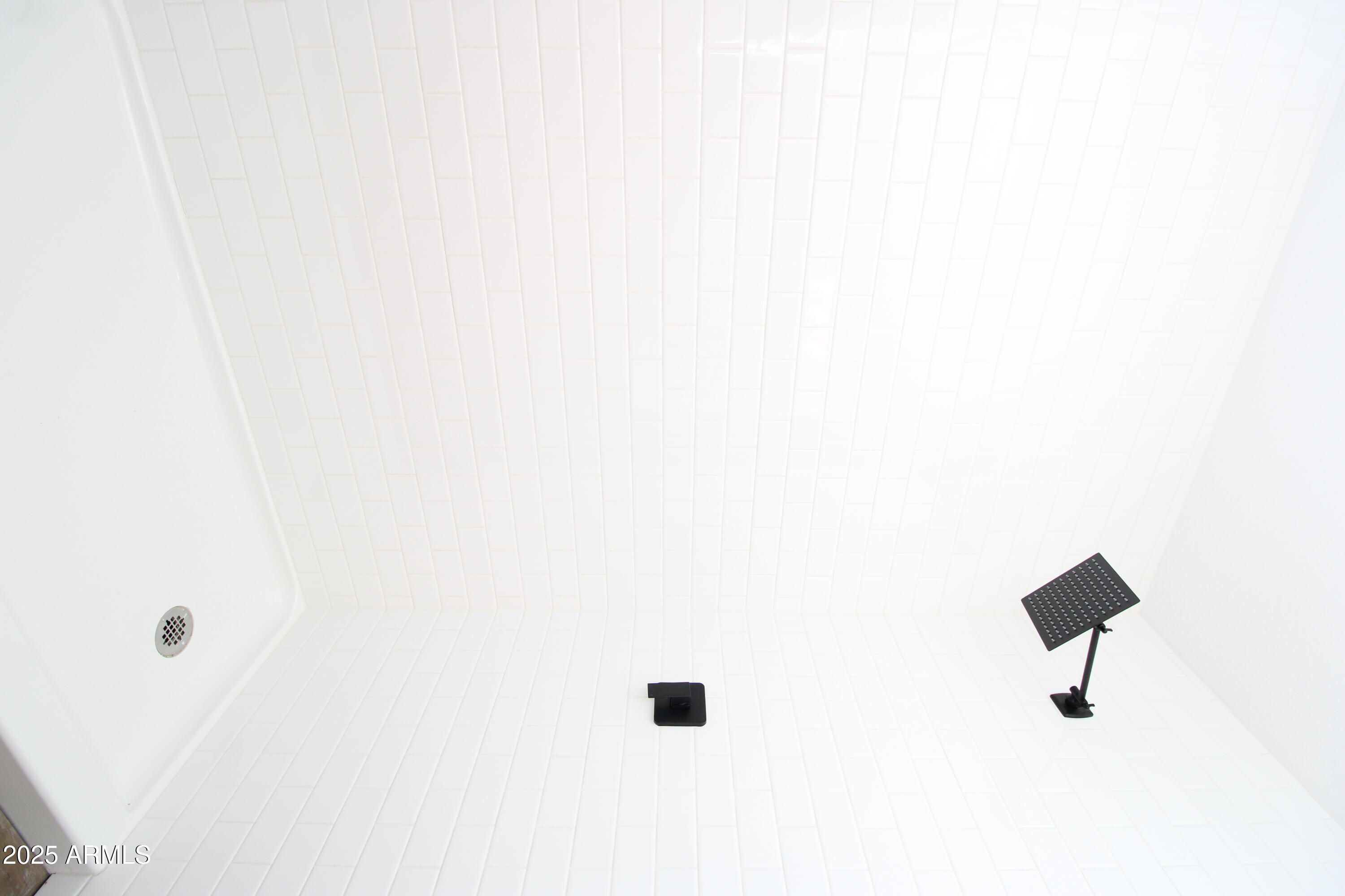 802 South 11th Avenue, Unit 4 Phoenix, AZ 85007 - Photo 10 of 11 a bathroom with a shower