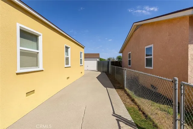 a front view of a house with wooden floor