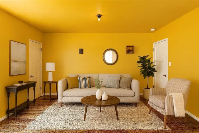a living room with furniture and a rug