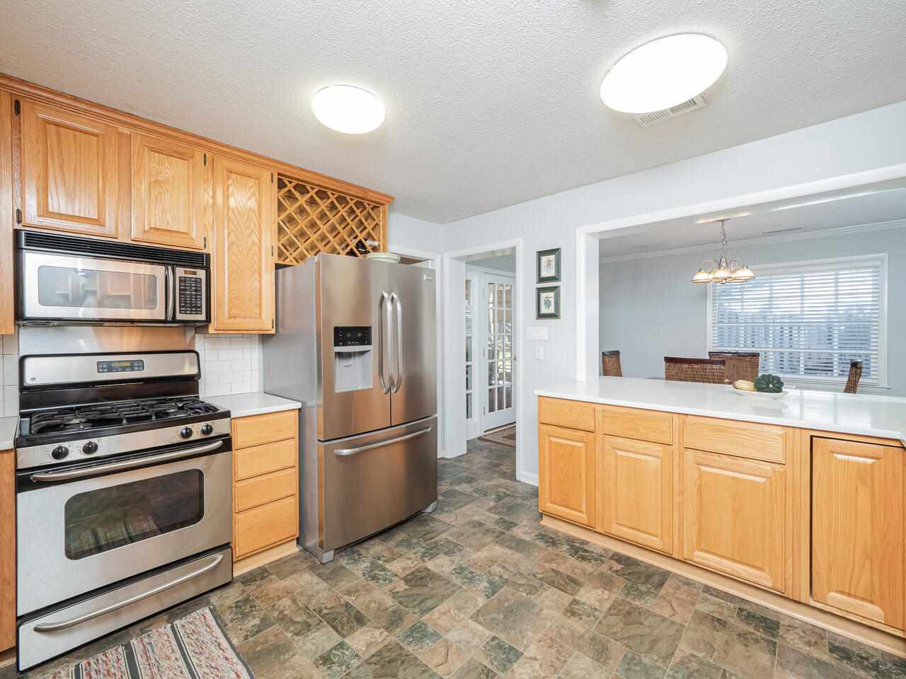 4617 Drexel Drive Raleigh, NC 27609 - Photo 8 of 29 Kitchen with SS Appliances