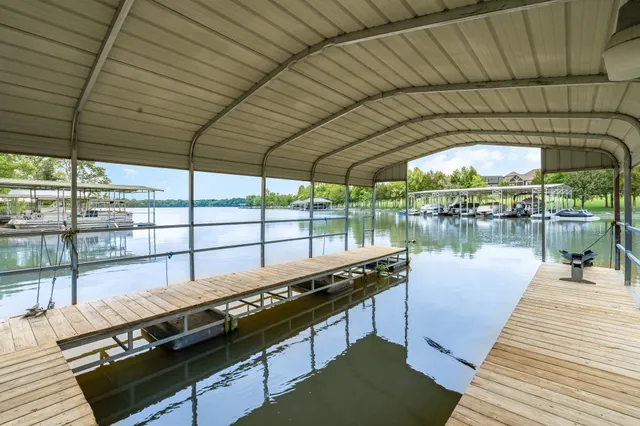 a view of swimming pool with outdoor seating