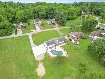 an aerial view of a house with a garden
