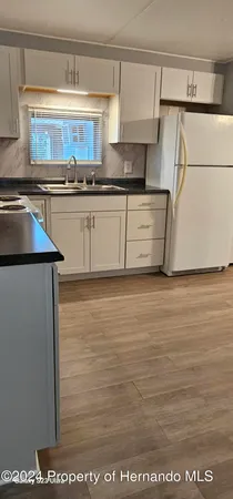 a bathroom with a shower and a toilet