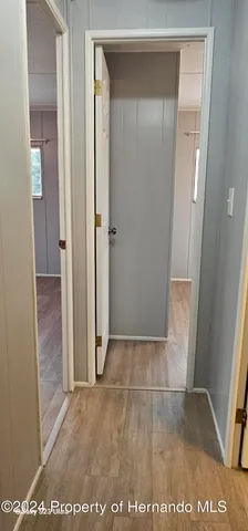 a bathroom with a shower and a toilet