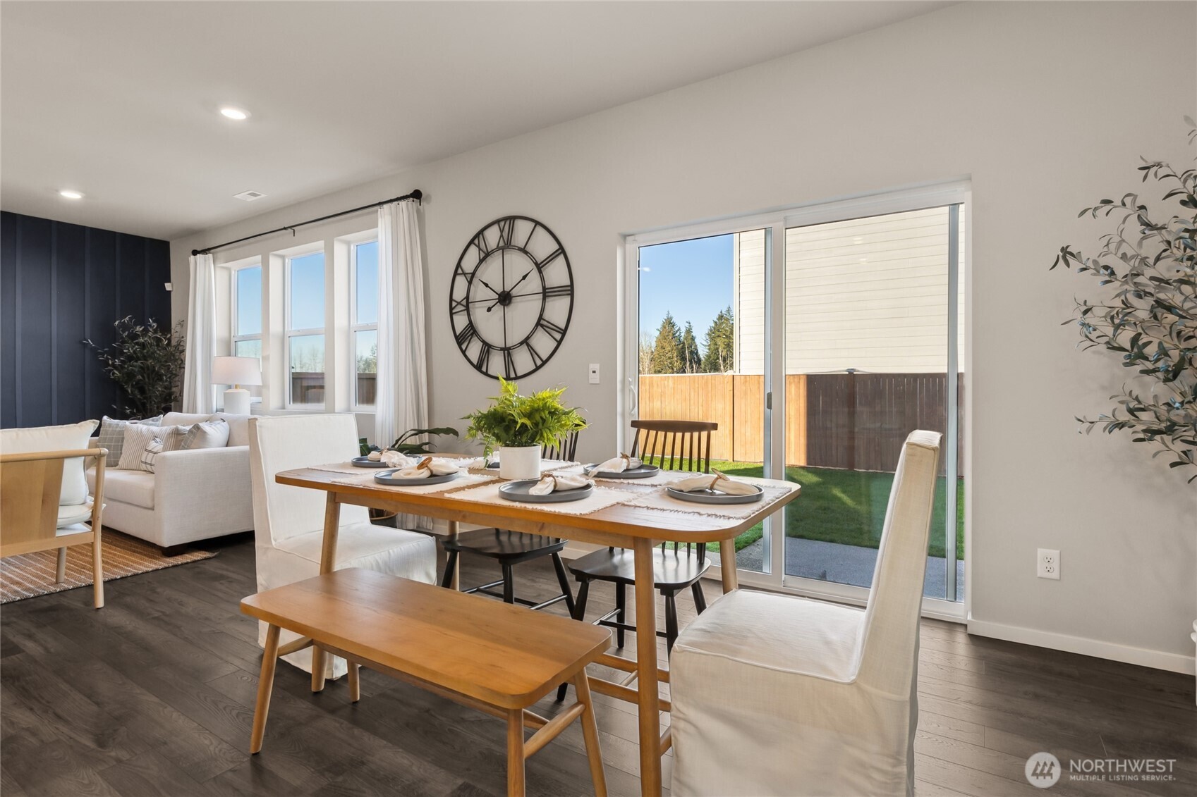 201 Cremini Loop Southeast, Unit 53 Lacey, WA 98513 - Photo 5 of 16 a view of a dining room with furniture window and wooden floor