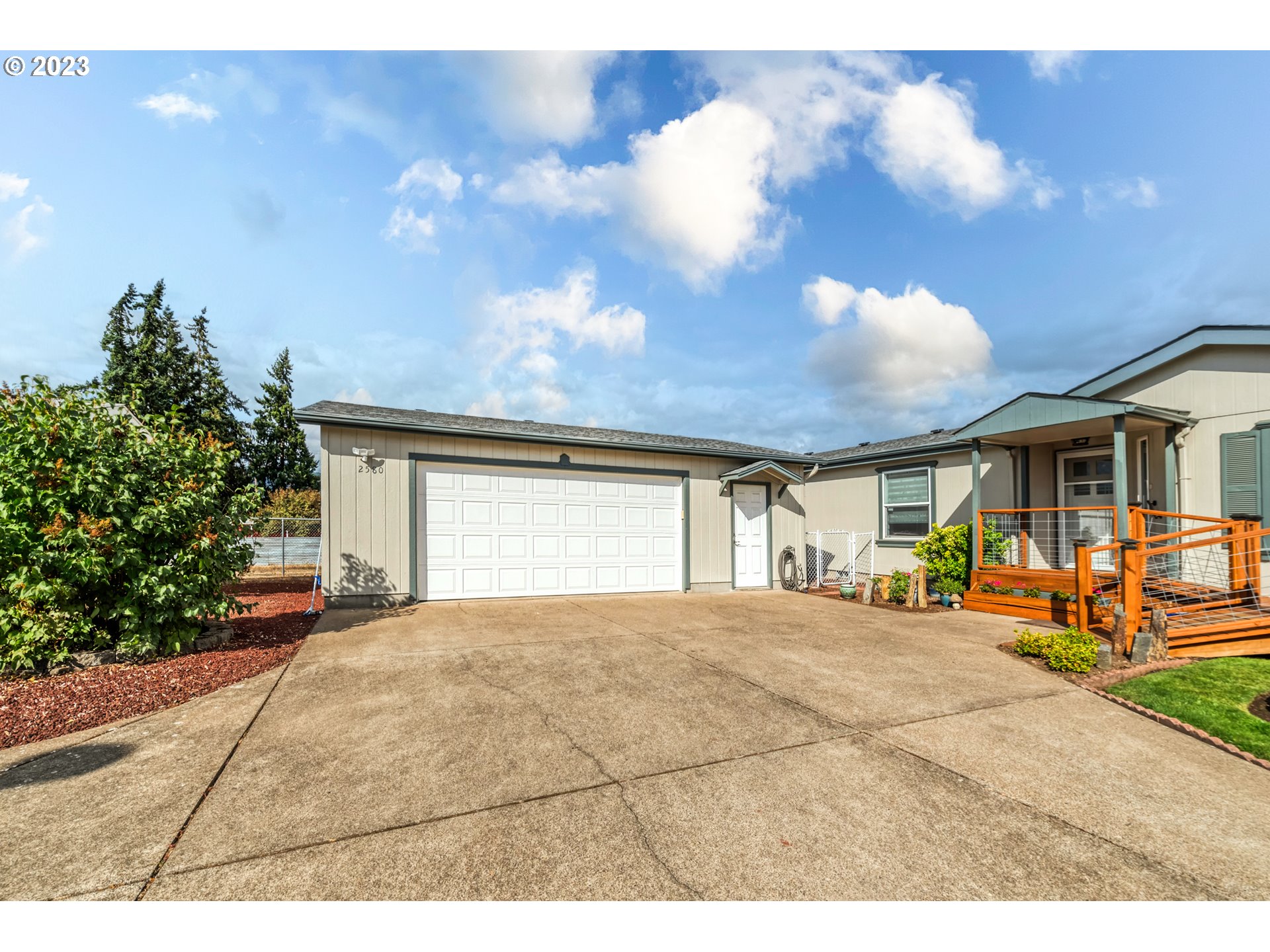 2580 Maia Loop Springfield, OR 97477 - Photo 3 of 29 a view of a house with basketball court