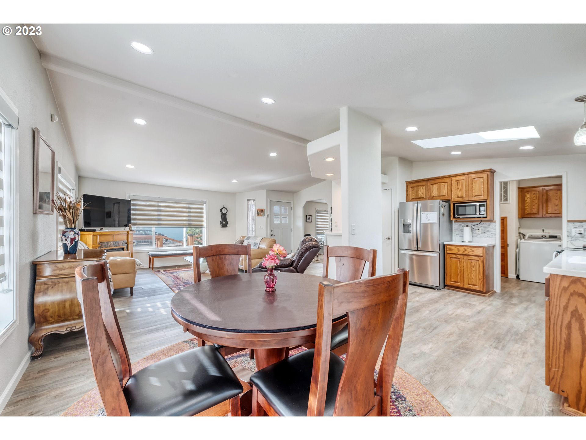 2580 Maia Loop Springfield, OR 97477 - Photo 8 of 29 a dining room with furniture and a kitchen view