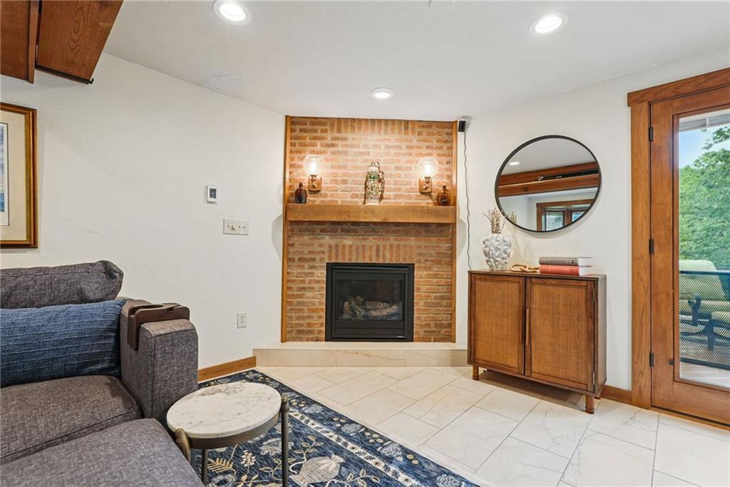 30 Club Road Carnegie, PA 15106 - Photo 12 of 49 a living room with furniture a fireplace and window