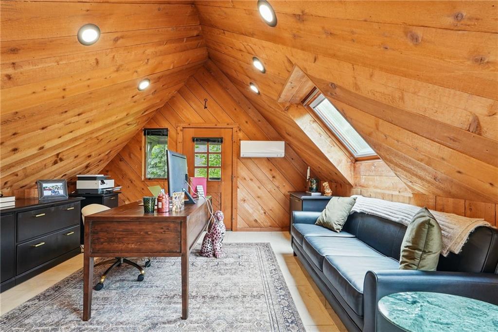 30 Club Road Carnegie, PA 15106 - Photo 17 of 49 a living room with furniture a rug and a large window