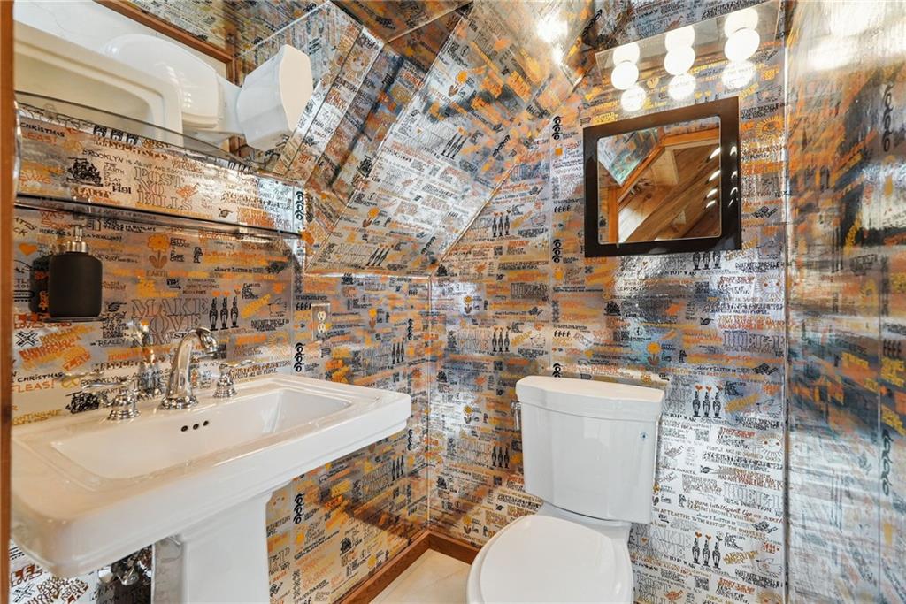 30 Club Road Carnegie, PA 15106 - Photo 19 of 49 a bathroom with a toilet sink and mirror