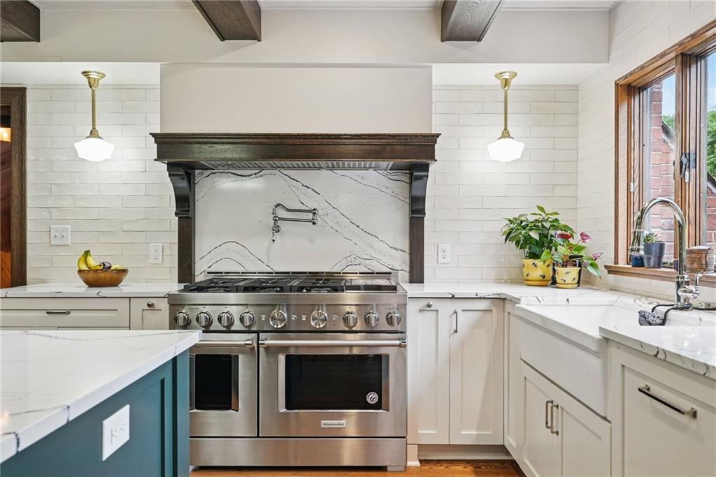 30 Club Road Carnegie, PA 15106 - Photo 27 of 49 a stove top oven sitting inside of a kitchen