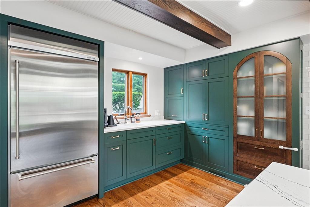 30 Club Road Carnegie, PA 15106 - Photo 28 of 49 a kitchen with granite countertop stainless steel appliances and wooden cabinets