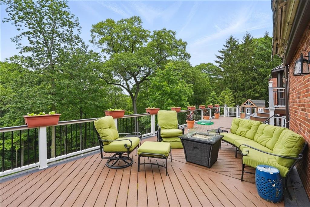 30 Club Road Carnegie, PA 15106 - Photo 42 of 49 a white bench sitting on top of a wooden deck