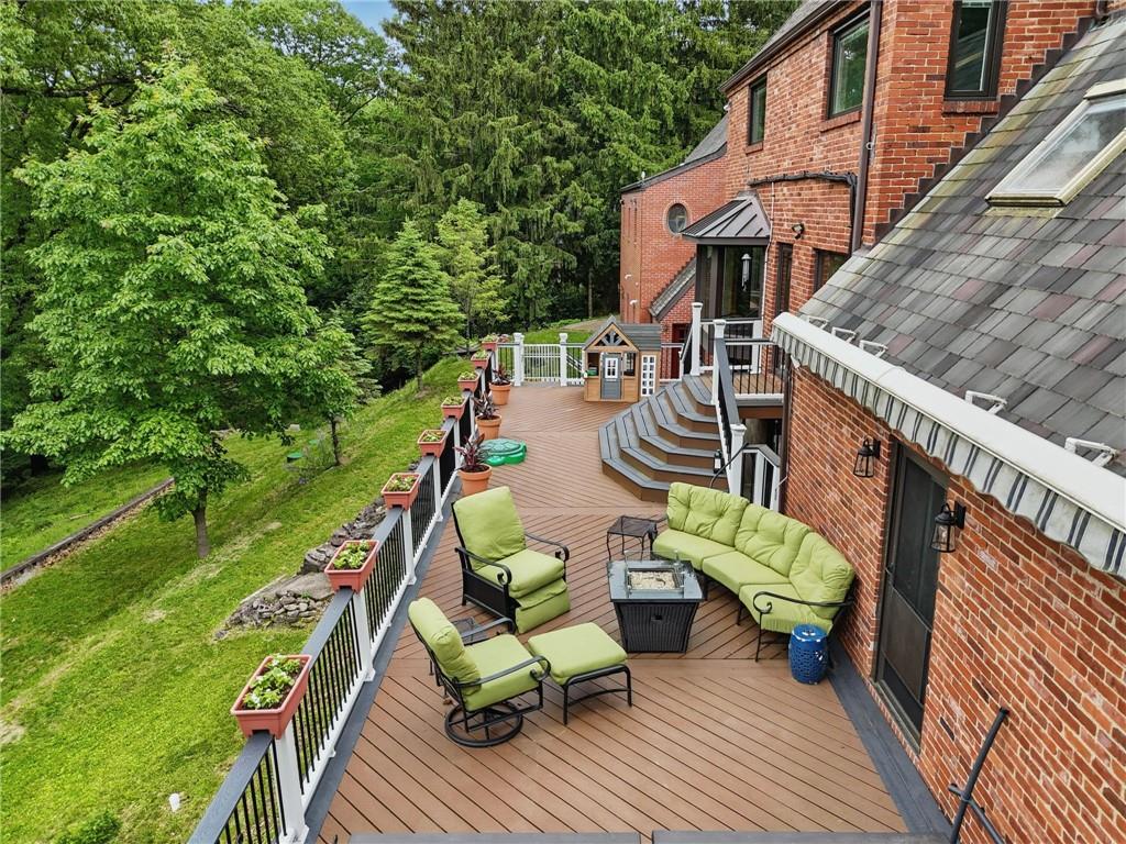 30 Club Road Carnegie, PA 15106 - Photo 45 of 49 a view of deck with table and chairs a barbeque with wooden floor and roof