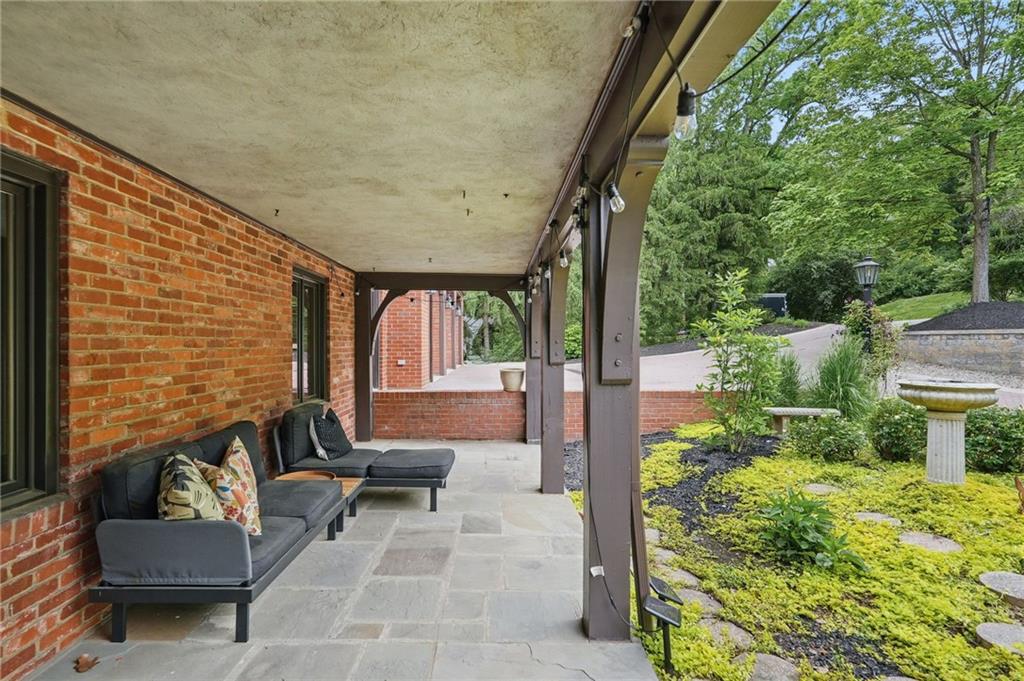 30 Club Road Carnegie, PA 15106 - Photo 6 of 49 a balcony with furniture and a potted plant