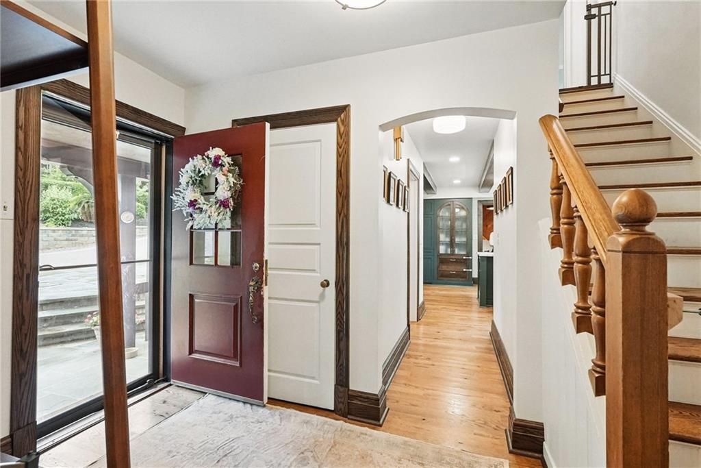 30 Club Road Carnegie, PA 15106 - Photo 8 of 49 a view of a hallway with wooden floor and staircase