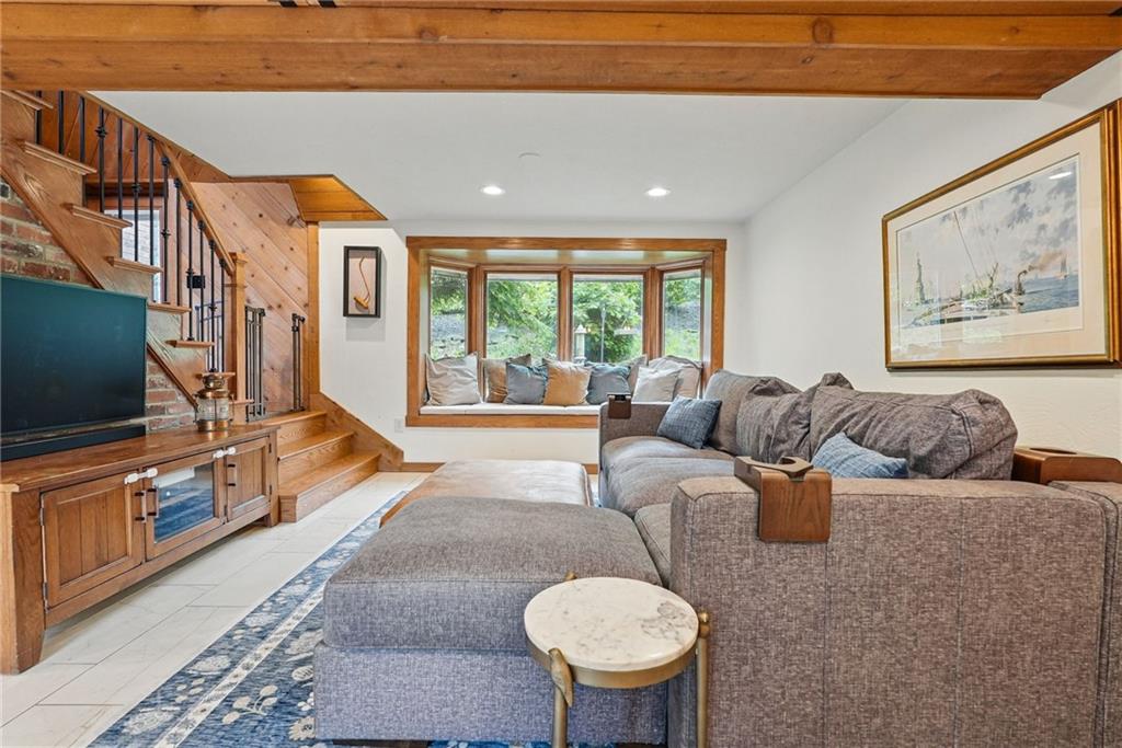 30 Club Road Carnegie, PA 15106 - Photo 9 of 49 a living room with furniture and a flat screen tv
