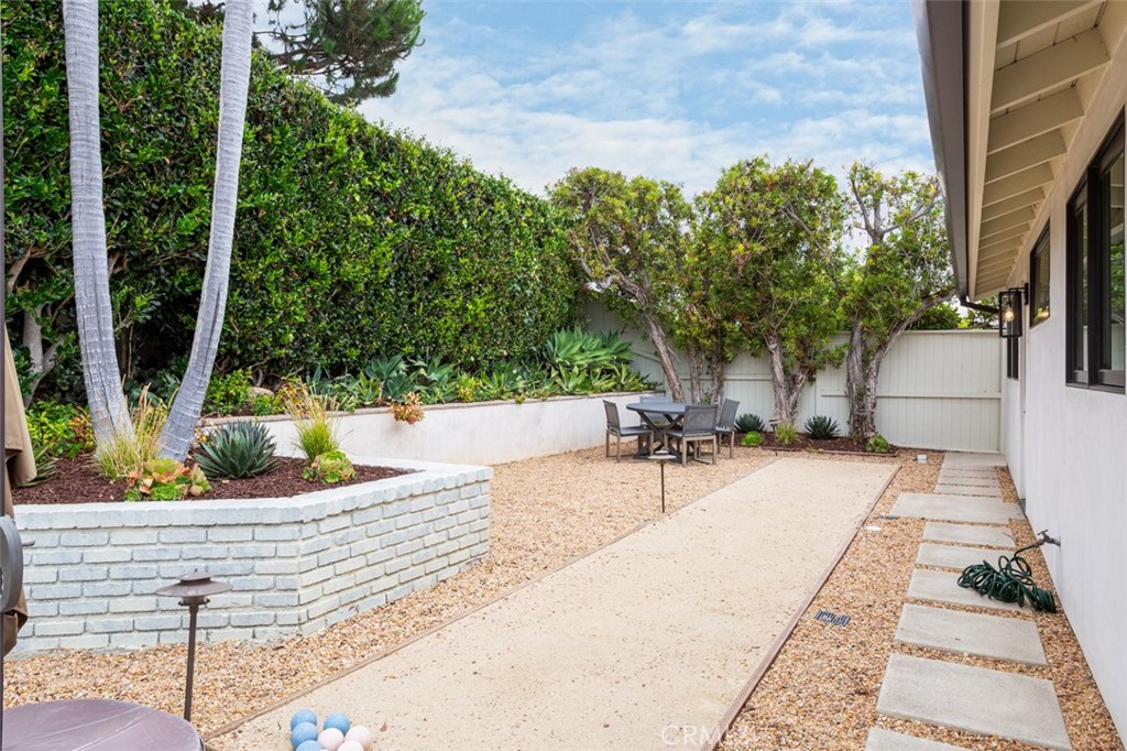 704 Emerald Bay Laguna Beach, CA 92651 - Photo 25 of 27 a view of a swimming pool with a patio