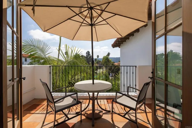 a outdoor view with a table and chairs