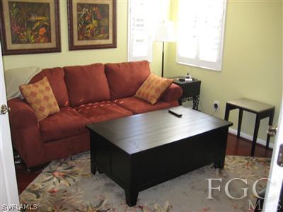 13002 Pennington Place, Unit 101 Fort Myers, FL 33913 - Photo 6 of 10 a view of a living room and furniture