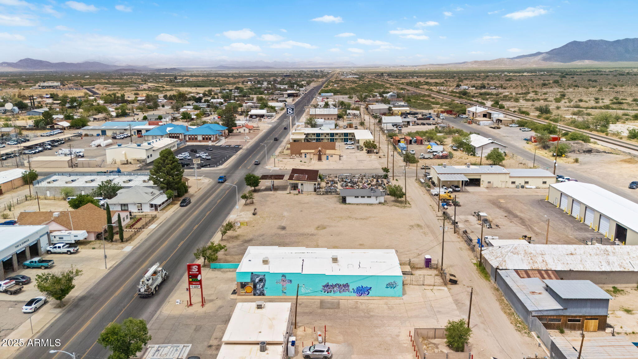 235 North Haskell Avenue, Unit 3 Willcox, AZ 85643 - Photo 6 of 7 an aerial view of residential houses with outdoor space
