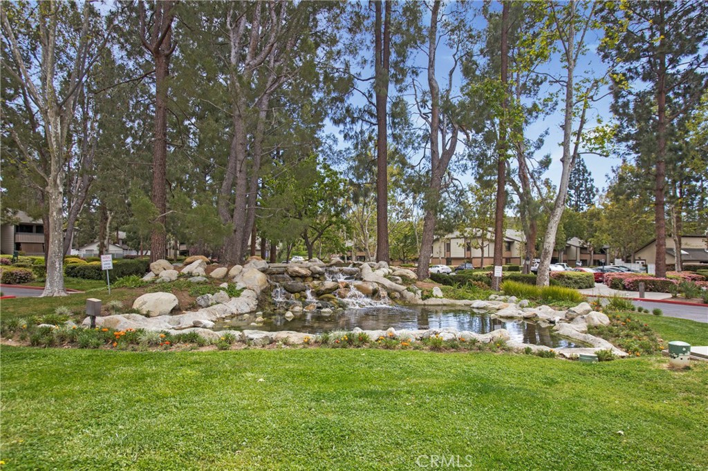 20702 El Toro Road, Unit 379 Lake Forest, CA 92630 - Photo 24 of 45 Beautiful water feature as you enter from the light at Pheasant Run