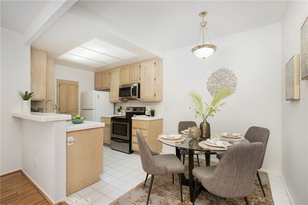 20702 El Toro Road, Unit 379 Lake Forest, CA 92630 - Photo 4 of 45 Breakfast bar and well lit kitchen are ideal for all your living needs