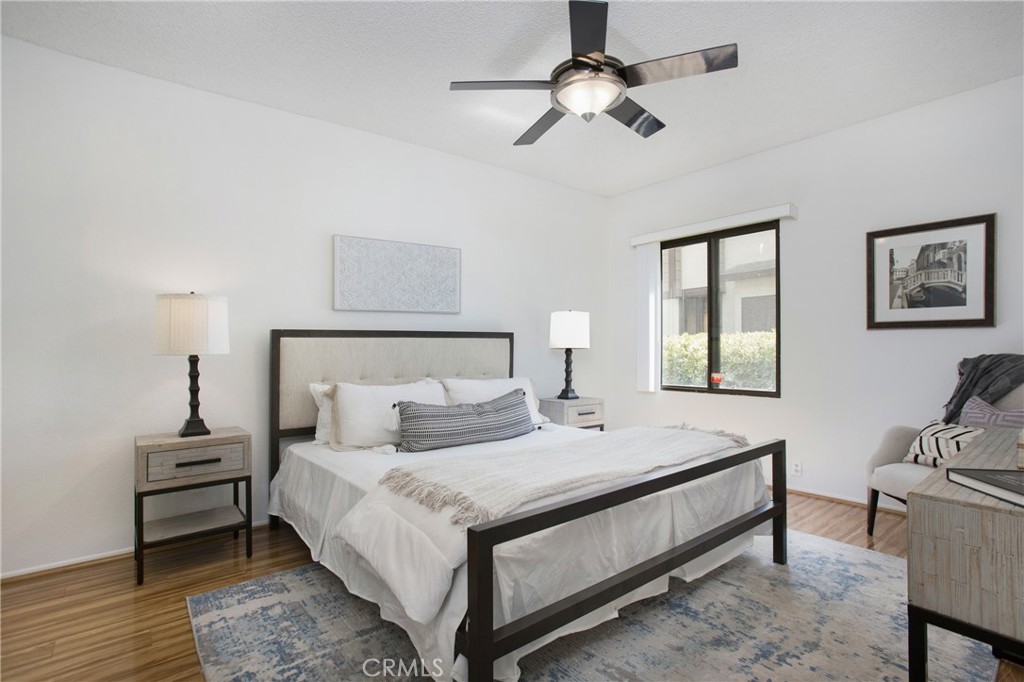 20702 El Toro Road, Unit 379 Lake Forest, CA 92630 - Photo 7 of 45 Large primary bedroom has plenty of space for your oversized bed