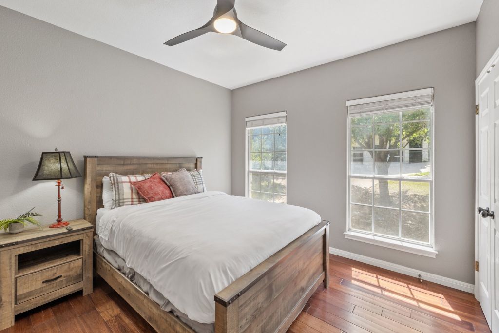 10800 Beach Road Leander, TX 78641 - Photo 22 of 39 Warm wood tones and large windows create a restful, sun-filled sanctuary.