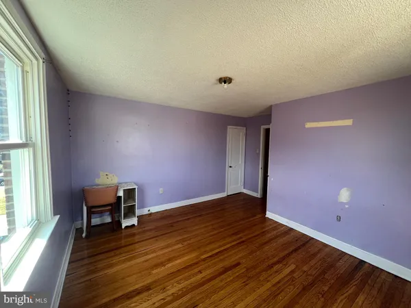 a view of a livingroom with furniture and window
