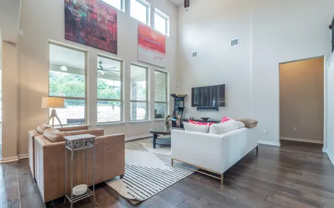 a living room with furniture and window