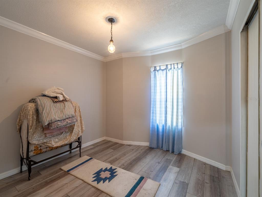13455 Northeast 228 Ln Road Fort McCoy, FL 32134 - Photo 20 of 51 a view of entryway with wooden floor