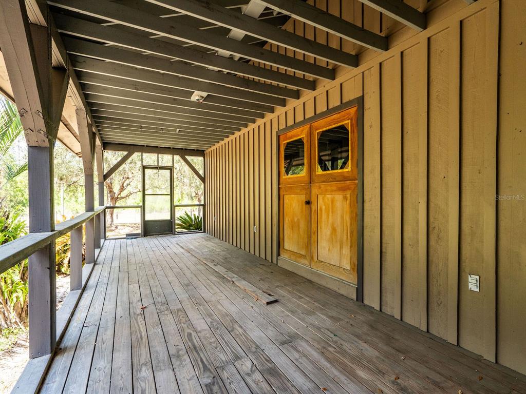 13455 Northeast 228 Ln Road Fort McCoy, FL 32134 - Photo 30 of 51 a view of empty room with wooden floor