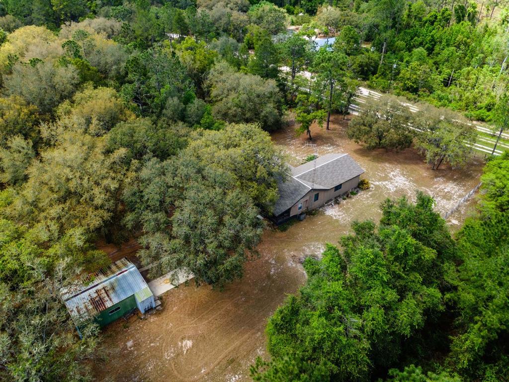 13455 Northeast 228 Ln Road Fort McCoy, FL 32134 - Photo 42 of 51 an aerial view of a house with a yard