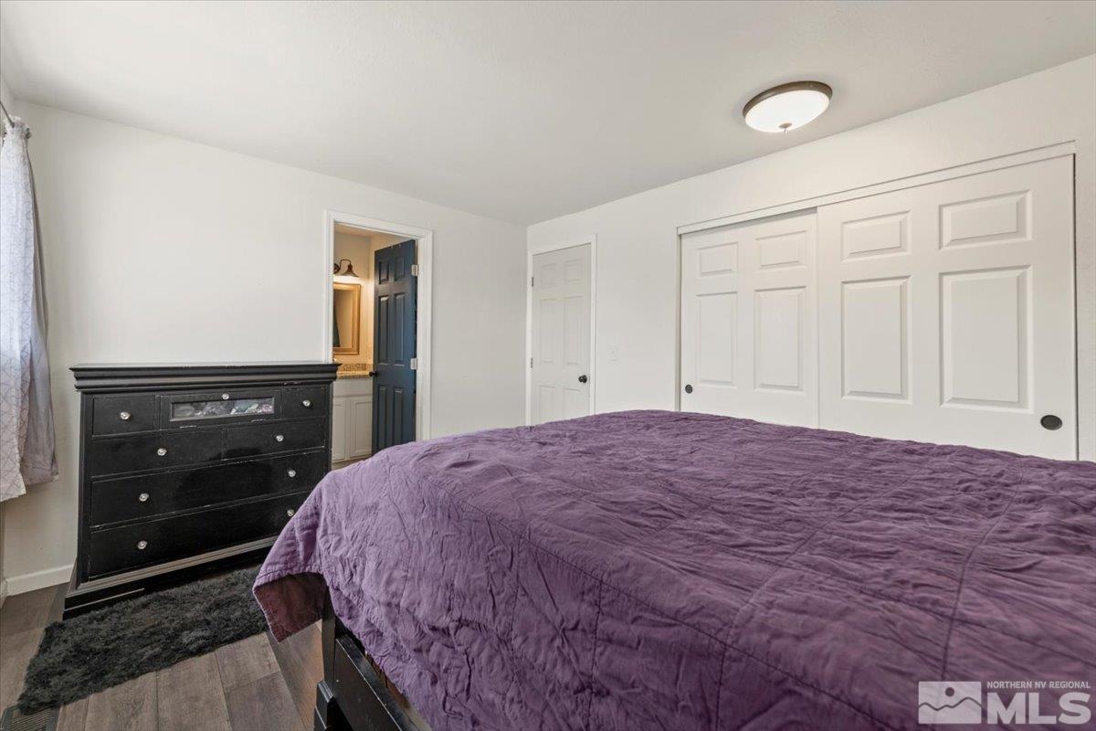 350 Sycamore Street Fernley, NV 89408 - Photo 13 of 24 a bedroom with a bed and a dresser
